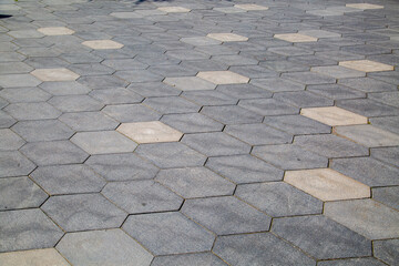 The natural stone sidewalk is diamond-shaped, with texture backgrounds for graphic design. The wallpaper is abstract.