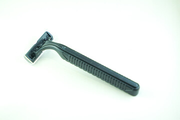 Black disposable razor, angled, on a plain white background.