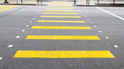 Zebra crossing yellow black traffic walkway road. Symbol for road traffic. Drivers must obey...