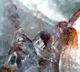 Beautiful close up of quartz crystal rock shard with reflective rainbow spiritual light
