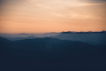 Aerial view of Bregenzerwald and Nagelfluh mountain range after sunset during a rare immersion...