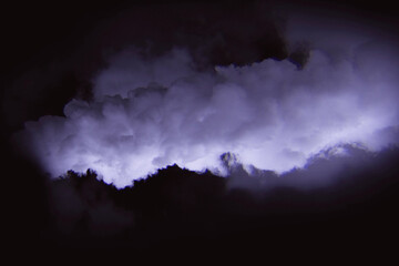 Colorful Smoke Clouds on Black Background in Pink, Green, and Purple Tones