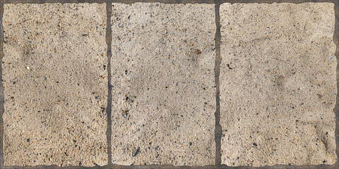 Sand-concrete block wall and floor background with a punched random tile design, mixed with coarse...