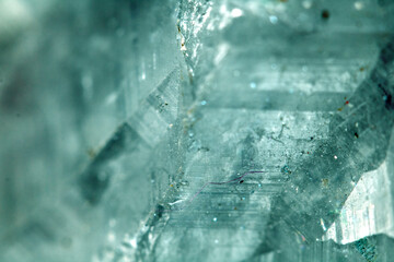 Beautiful close up of quartz crystal rock shard with reflective rainbow spiritual light