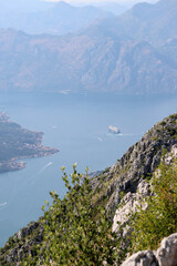 View of a cruise ship sailing away in the Bay of Kotor. Montenegro