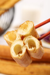 Crispy fritters fried to perfection for a delightful breakfast experience at a cozy kitchen setting