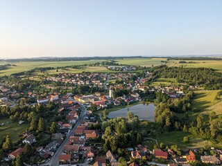 Aerial panorama of Stonarov town center in Vysocina region with church and rooftops