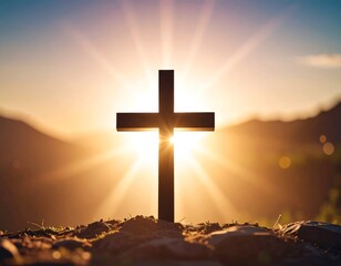 Silhouette cross at sunrise