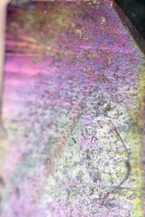 Beautiful close up of quartz crystal rock shard with reflective rainbow spiritual light