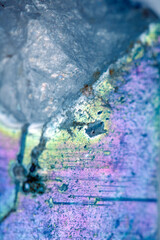 Beautiful close up of quartz crystal rock shard with reflective rainbow spiritual light