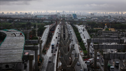 Aerial view city transport traffic road rainny day junction cross road