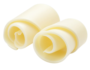 Curled, creamy butter portions, shaped into elegant rolls, showcasing a smooth texture and rich color.