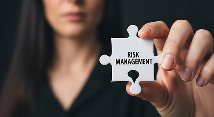 Woman Holding Risk Management Puzzle Piece white puzzle