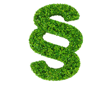 A vibrant, green symbol made of leaves, resembling a section sign, representing nature and growth.