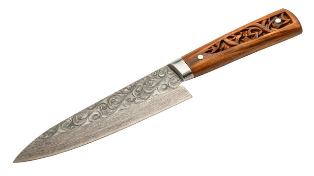 Close up of a sharp chef knife with ornate blade and carved wooden handle isolated on transparent background