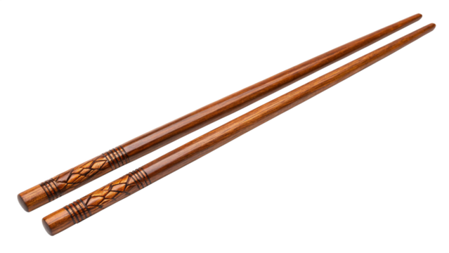 Pair of wooden chopsticks with decorative pattern isolated on transparent background for eating asian food