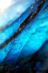 Beautiful close up of quartz crystal rock shard with reflective rainbow spiritual light