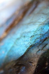 Beautiful close up of quartz crystal rock shard with reflective rainbow spiritual light