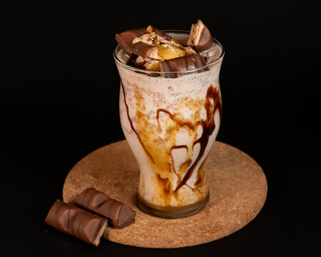 Assortment of Delicious Frappes and Milkshakes on Plain Background