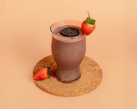 Assortment of Delicious Frappes and Milkshakes on Plain Background