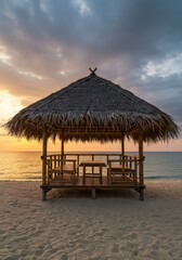 Fototapeta premium Tropical Bamboo Beach Hut at Sunset