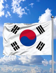 South Korean flag billowing in a bright, cloudy sky
