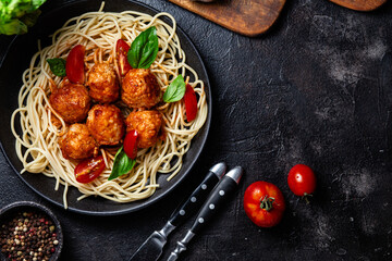 Spaghetti and Meatballs Dish with Fresh Tomatoes and Basil