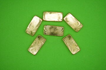 Gold bars, gold color, containing 96.5 percent gold.