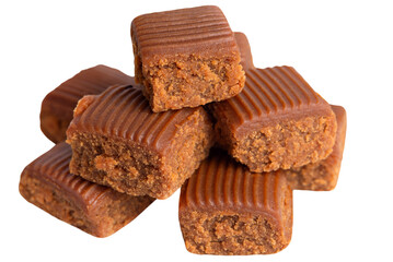 Cubes of toffee arranged in a pile - real dessert photo for product design.