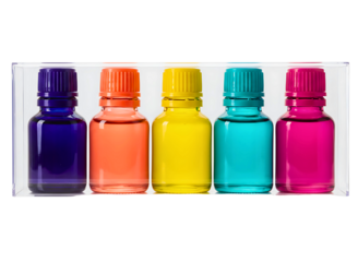 Five colorful small glass bottles with plastic caps isolated on transparent background