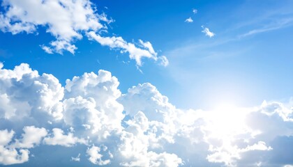 Vivid blue sky filled with fluffy white cumulus clouds, sun shining brightly (1)