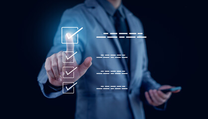 Businessman mark checkboxes, Survey form, check marks on checklist,Checklist concept.