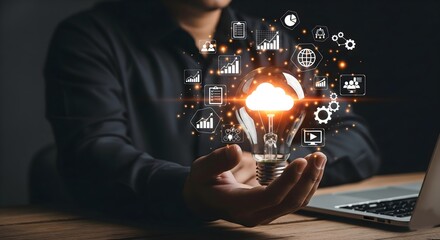 the fusion of creative ideas with technology, data, and cloud services in a business or digital context. A laptop is partially visible on a wooden desk to the side.