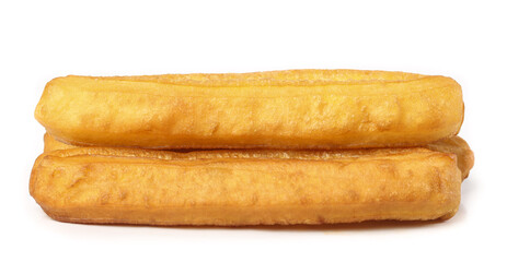 Crispy gourmet fritters stacked on a white background showcasing traditional culinary treats perfect for snacking