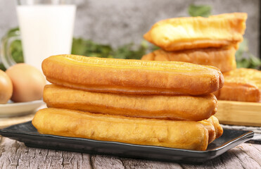 Delicious crispy fritters served as traditional snacks in a cozy kitchen setting at midday