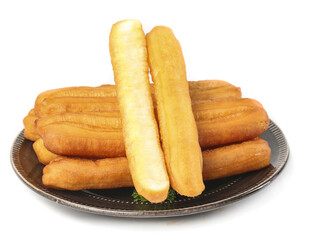 Crispy fried fritters served on a plate for a delightful traditional breakfast experience