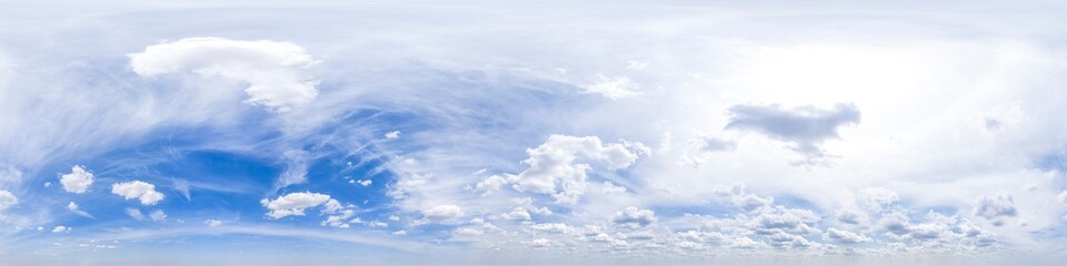Spherical panorama of cloudy sky with high standing sun shining through clouds