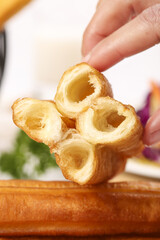 Crispy doughnut snacks showcase traditional preparation and delightful texture in a vibrant culinary setting