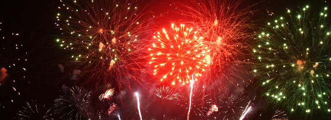 Banner red firework night time celebrate national holiday. Countdown new year 2025 festival with copy space. Banner Red Firework celebrate anniversary happy new year 2026 4th of july holiday festival