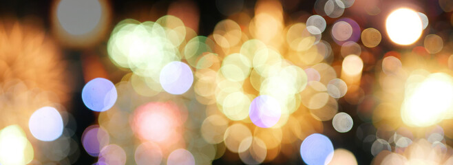 Banner Blurred background Gold Firework celebrate anniversary. Blurry gold firework night celebrate...