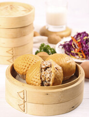 Crafting cantonese style handmade morning tea popping walnut buns in a cozy kitchen