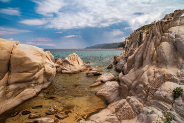 Beautiful landscape with rocky shore of the beach on the Mediterranean Sea in Greece, Travel concept.