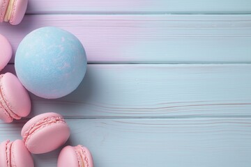 Pink Macarons and Blue Bath Bomb – Lower Left Corner on Sparkling Pastel Wooden Background