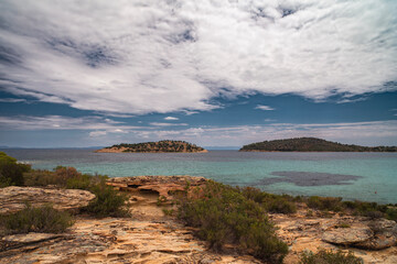 Beautiful landscape with rocky shore of the beach on the Mediterranean Sea in Greece, Travel concept.