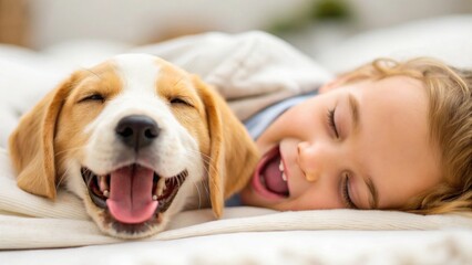 A joyful child and a dog share a cozy moment, both smiling contentedly while lying together on a bed.