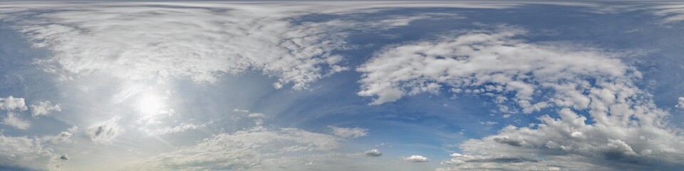 seamless cloudy blue sky hdri panorama 360 degrees angle view with zenith and beautiful clouds for use in 3d graphics or game development as sky dome or edit drone shot