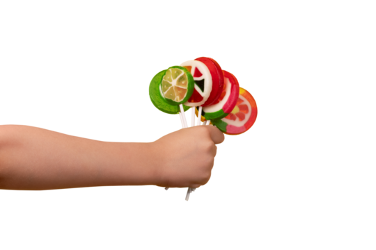 Child’s hand holding colorful fruit lollipops, isolated on transparent background for clean and versatile design use... - Powered by Adobe