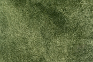 Green colored fabric with crackled suede leather texture