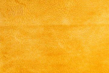 Yellow colored  fabric with crackled suede leather texture