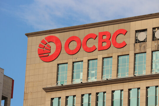 OCBC Bank logo on modern skyscraper  &ndash; Asian financial district, urban architecture, corporate branding, business skyline in Kuala Lumpur, Malaysia, February 20, 2025